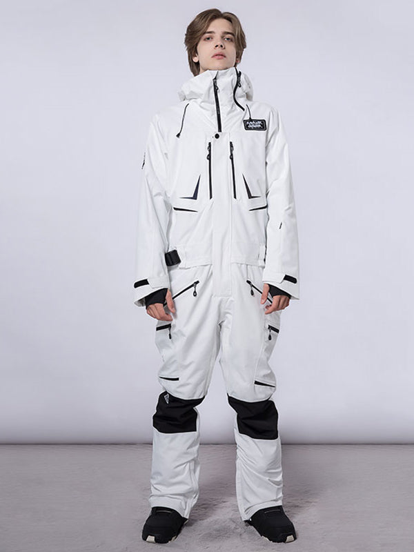 Men's RAWRWAR high land cargo one-piece snowsuit by Les Odettes, featuring a insulated winter suit with cargo pockets and a hood.