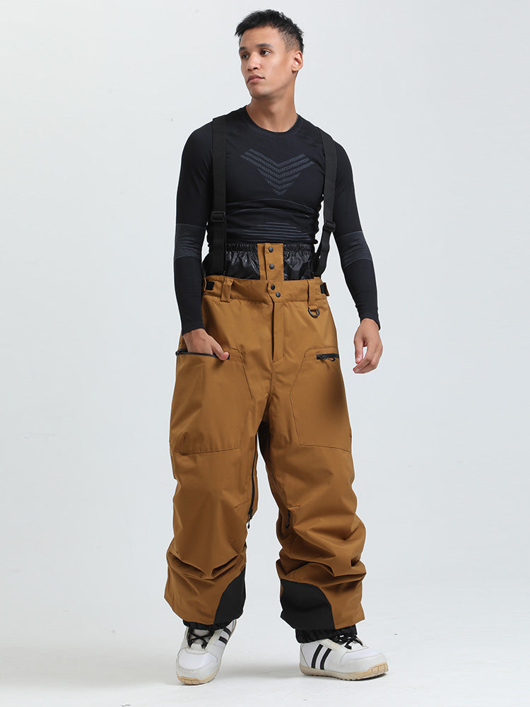 Womens snow pants by Les Odettes, durable mountain cargo snow bibs with all-weather functionality and adjustable straps.