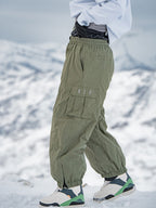 Men's Rabbit Snow StreetFlow Freestyle Cargo Baggy Snow Pants by Les Odettes, showing black, loose-fitting winter snow pants with cargo pockets.