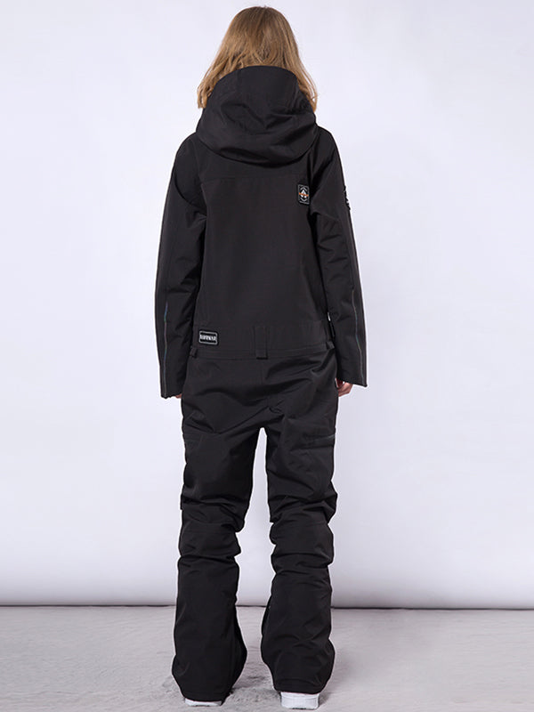 Men's RAWRWAR high land cargo one-piece snowsuit by Les Odettes, showing the full front view with cargo pockets and winter design.
