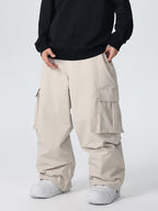 Men's Les Odettes Searipe durable mountain snow pants with all-function baggy design, suitable for winter snow activities.