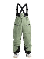 Womens snow pants by Les Odettes, durable mountain cargo snow bibs with all-function features for winter outdoor activities.