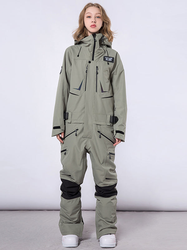 Men's RAWRWAR high land cargo one-piece snowsuit by Les Odettes, featuring durable fabric and cargo pockets, suited for winter outdoor activities.