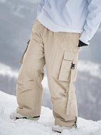 Men's Rabbit Snow UrbanRush Prime cargo baggy snow pants by Les Odettes, featuring a relaxed fit and durable winter fabric.