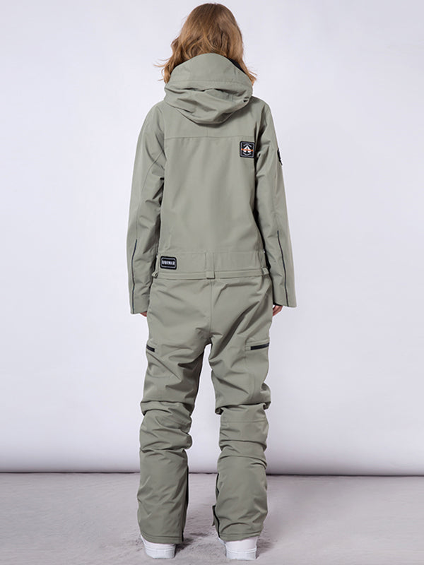 Men's RAWRWAR High Land Cargo one-piece snowsuit by Les Odettes, featuring rugged design and cargo pockets, suitable for winter outdoor activities.