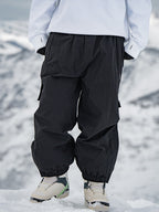 Men's Rabbit Snow StreetFlow Freestyle Cargo Baggy Snow Pants by Les Odettes, featuring a relaxed fit and winter-ready design.