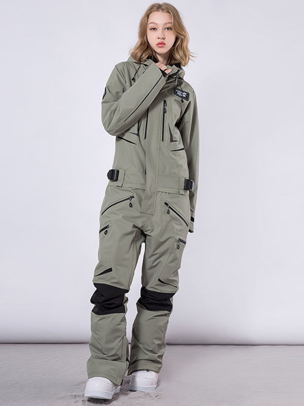 Men's Les Odettes RAWRWAR highland cargo one-piece snowsuit with durable fabric and multiple cargo pockets, suitable for winter outdoor activities.