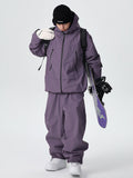 Men's Searipe unisex durable mountain snow suit by Les Odettes, featuring waterproof fabric and a baggy fit for all-weather snow conditions.