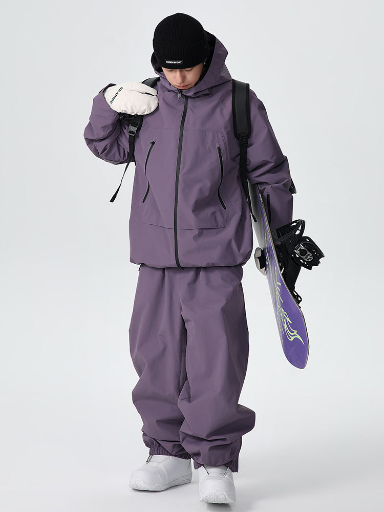 Men's Searipe unisex durable mountain snow suit by Les Odettes, featuring waterproof fabric and a baggy fit for all-weather snow conditions.