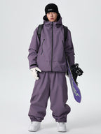 Men's Searipe unisex mountain snow suit by Les Odettes featuring durable, all-weather baggy design for winter outdoor activities.
