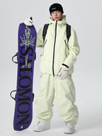 Men's Searipe Unisex durable mountain snow suit by Les Odettes, showing the all-weather baggy design with insulated snow gear in a winter setting.