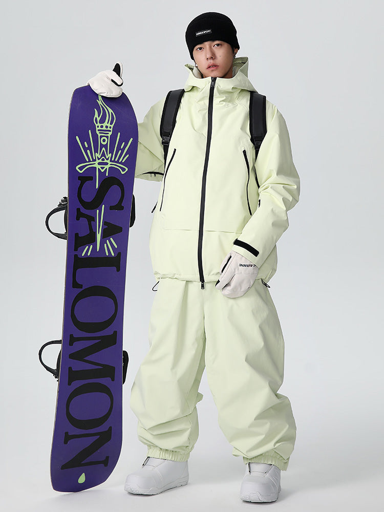 Men's Searipe Unisex durable mountain snow suit by Les Odettes, showing the all-weather baggy design with insulated snow gear in a winter setting.