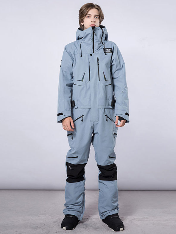 Men's RAWRWAR high land cargo one-piece snowsuit by Les Odettes, featuring a rugged snowproof design and cargo pockets.