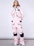Men's RAWRWAR high land cargo one-piece snowsuit by Les Odettes, showing the insulated winter suit with cargo pockets and hood.