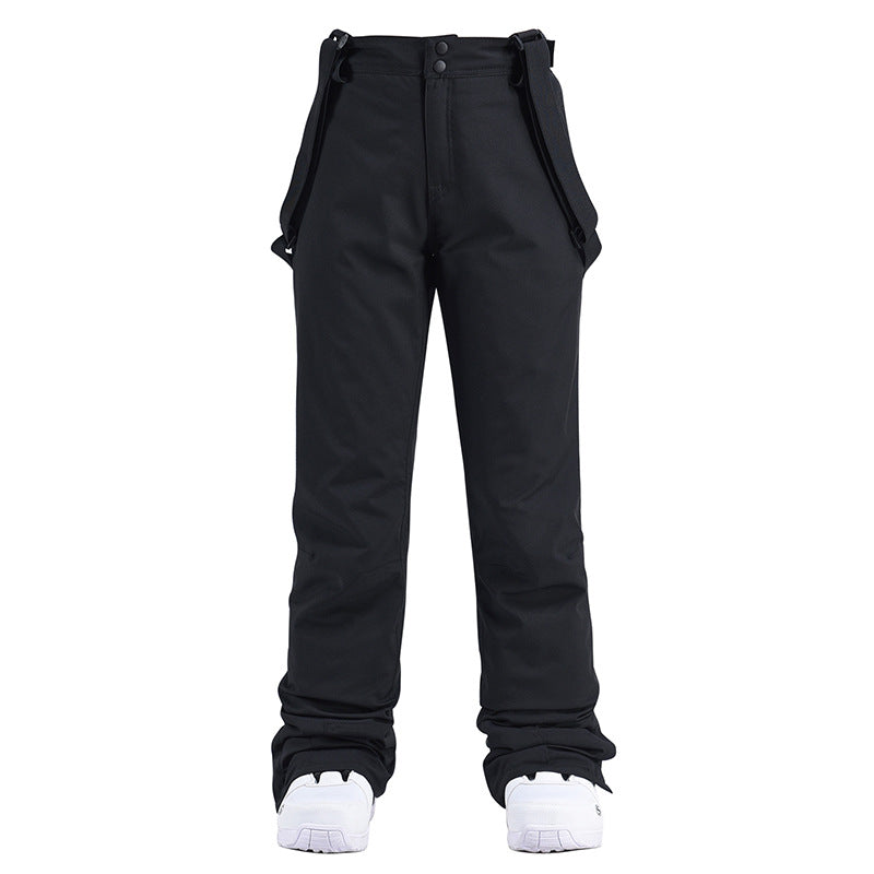Women's insulated snow pants by Les Odettes, winter ski bibs with warm, waterproof material, suitable for snowy mountain adventures.
