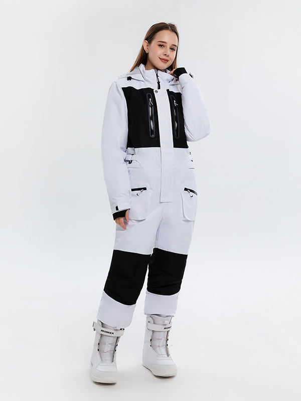 Les Odettes Women's Arctic Queen Slope Star Icon Ski Suit, one-piece winter snow jumpsuit in vibrant colors, suitable for skiing and winter sports.