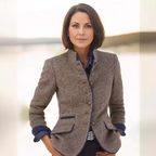 Victoria™ handcrafted jacket by Les Odettes, stylish and tailored with detailed craftsmanship, shown in a side view.