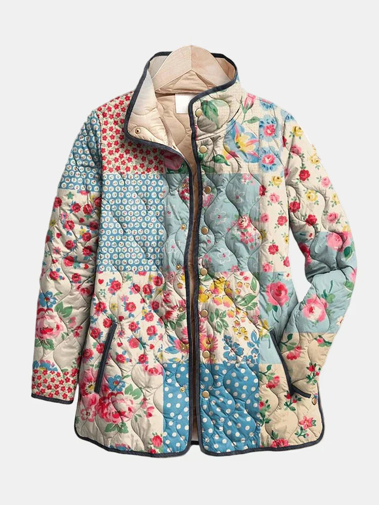 Emily™ floral quilted jacket by Les Odettes featuring charming floral patterns and a stylish quilted design.