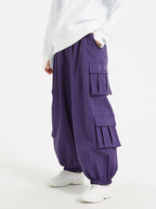 Men's Les Odettes Rabbit Snow Prime cargo snowboard pants with baggy fit, waterproof fabric, and multiple pockets for winter snowboarding.