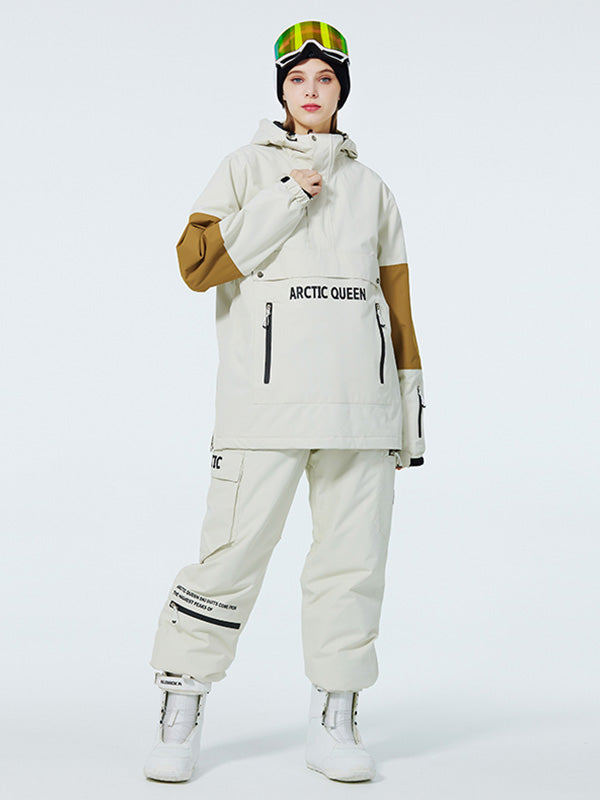 Men's SnowCrest FrostTrek half-zip anorak snowboarding suit by Les Odettes, shown in a winter outdoor setting.