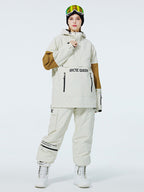 Men's SnowCrest FrostTrek half-zip anorak snowboarding suit by Les Odettes, shown in a winter outdoor setting.