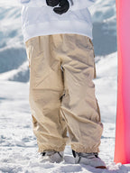 Men's Les Odettes Rabbit Snow Prime cargo snowboard pants with baggy fit, black waterproof fabric, and multiple pockets for winter snowboarding.