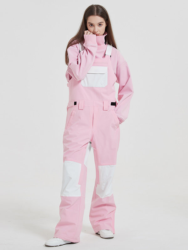 Women's Les Odettes snow pants with rabbit snowflake pattern, freestyle mountain snowboard bibs for skiing and winter snowboarding.