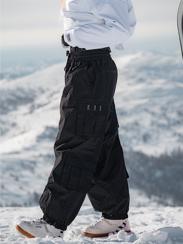 Men's Les Odettes Rabbit Snow Prime Cargo snowboard pants in baggy style with multiple pockets and snow-resistant fabric.