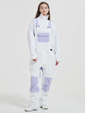 Women's Rabbit Snow Freestyle Mountain snowboard pants by Les Odettes, featuring waterproof ski bibs with adjustable straps and snow-resistant fabric.