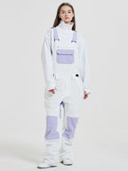 Women's Rabbit Snow Freestyle Mountain snowboard pants by Les Odettes, featuring waterproof ski bibs with adjustable straps and snow-resistant fabric.