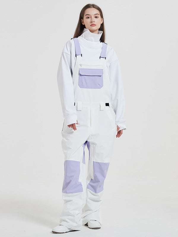 Women's Rabbit Snow Freestyle Mountain snowboard pants by Les Odettes, featuring waterproof ski bibs with adjustable straps and snow-resistant fabric.