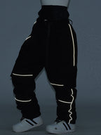 Women's SnowCraze Alpine Explorer freestyle snow pants by Les Odettes, featuring waterproof fabric and adjustable waist for winter snow activities.