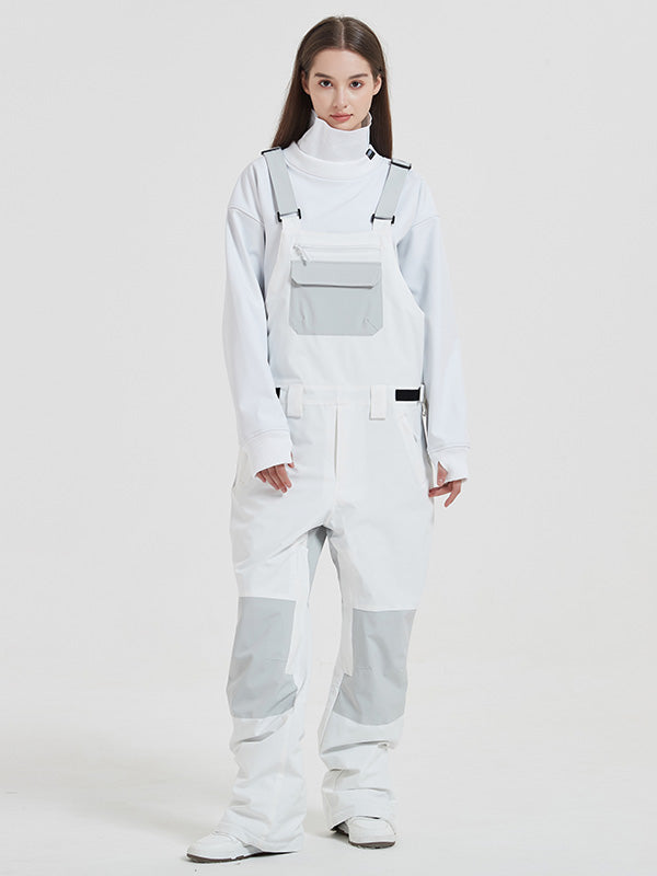 Women's Les Odettes snowboarding bibs with rabbit pattern, insulated snow pants for mountain skiing and freestyle snowboarding.