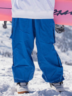 Men's Les Odettes snowboard pants in baggy style with rabbit snow prime cargo design, suitable for winter snowboarding activities.