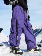 Men's Les Odettes snow pants with baggy fit, designed for snowboarding and winter wear, featuring a relaxed mountain style.