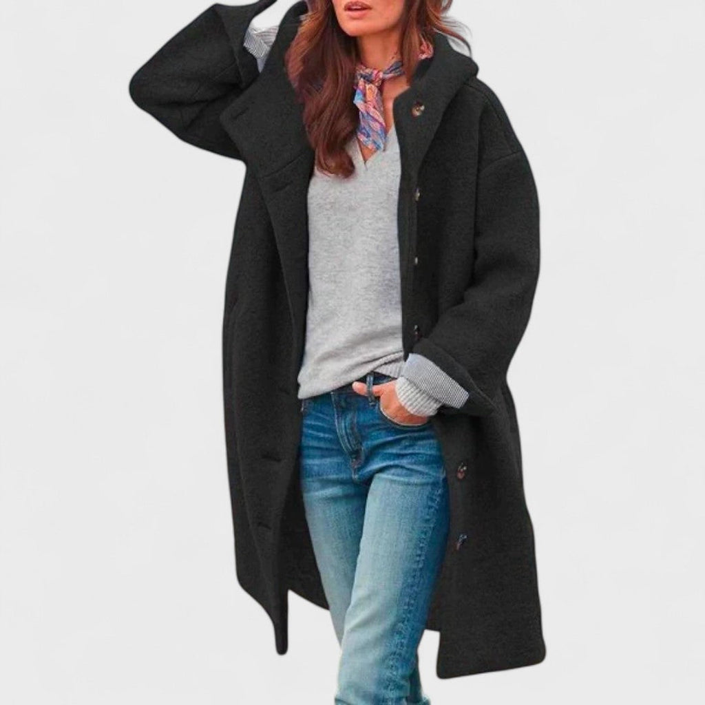 Les Odettes Margie™ Sleek City Jacket in black, tailored with a slim fit, featuring a high collar and minimalist design.