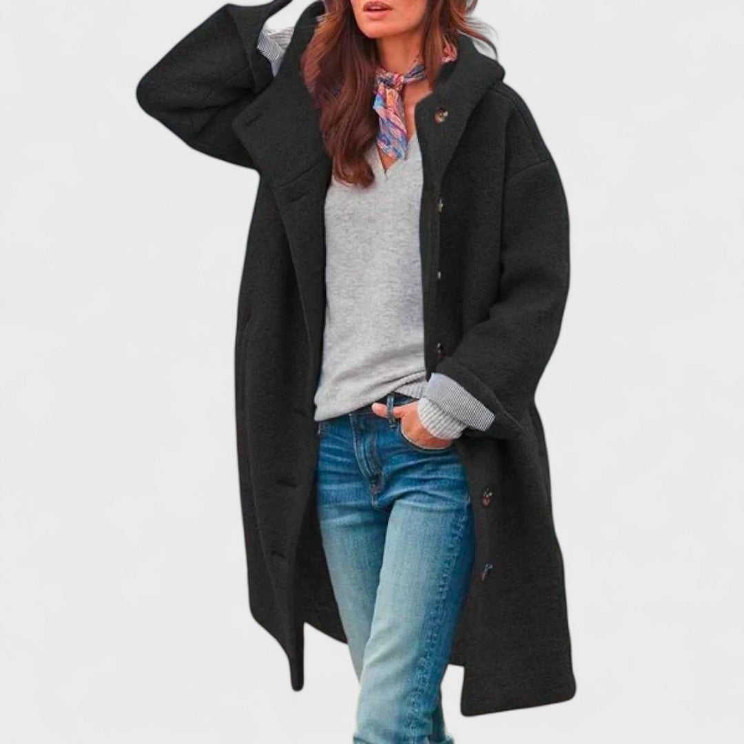 Les Odettes Margie™ Sleek City Jacket in black, tailored with a slim fit, featuring a high collar and minimalist design.