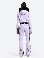 Women's classic faux fur one-piece ski suit by Les Odettes, featuring a stylish ski design with a hood and insulation.