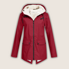 Les Odettes ThermaShell™ waterproof and windproof rain jacket, showing its sleek design and durable fabric for outdoor protection.