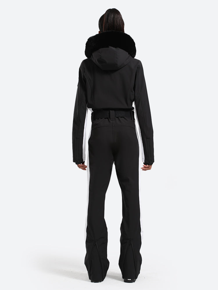 Les Odettes women's classic faux fur one-piece ski suit, featuring a warm, stylish ski outfit with fur accents and a snug fit.