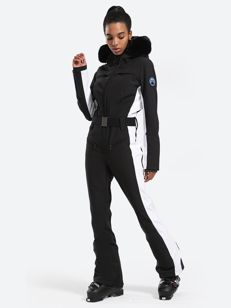 Les Odettes women's classic faux fur one-piece ski suit, featuring a stylish ski suit with fur lining and winter-ready design.
