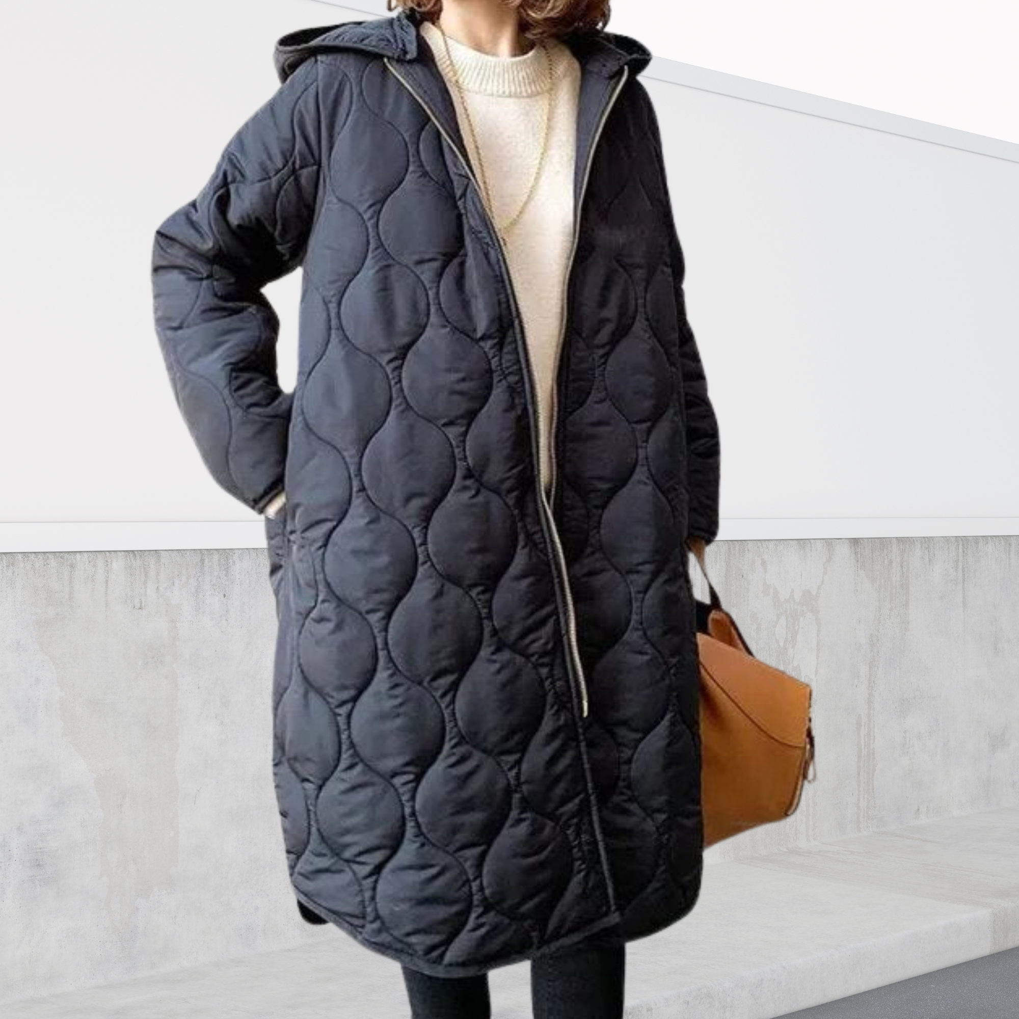 Les Odettes Nordica oversized hooded parka with detailed stitching and a plush hood, ideal for cold weather coats and jackets.