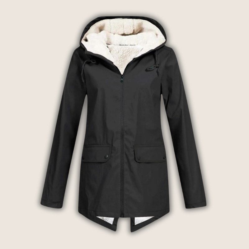 Les Odettes ThermaShell™ windproof and waterproof rain jacket in dark color, showing its lightweight, durable outdoor coat design.