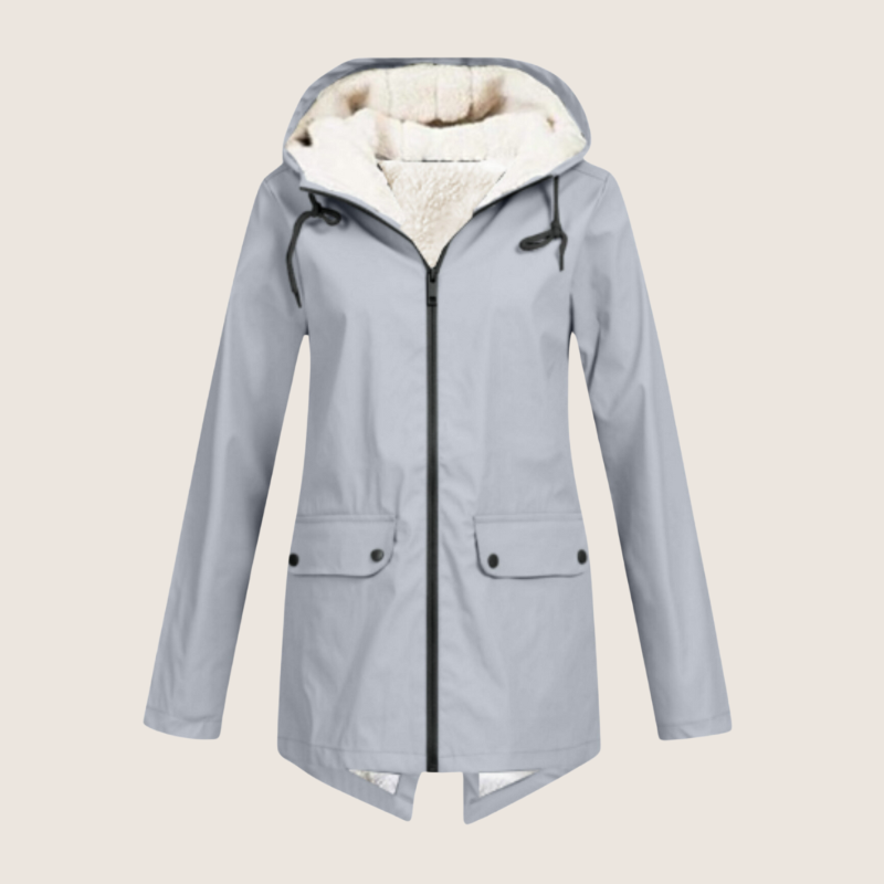 Les Odettes ThermaShell windproof and waterproof rain jacket, shown in bright blue with a hood and adjustable cuffs.