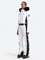 Les Odettes women's classic faux fur one-piece ski suit, stylish and warm ski outfit with fur details for winter sports.