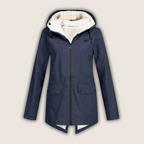 Les Odettes ThermaShell™ windproof and waterproof rain jacket, lightweight coat with hood, suitable for outdoor weather protection.