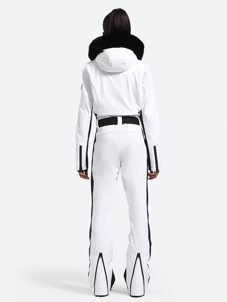 Les Odettes women's classic faux fur one-piece ski suit, featuring a sleek design with faux fur accents for winter skiing.