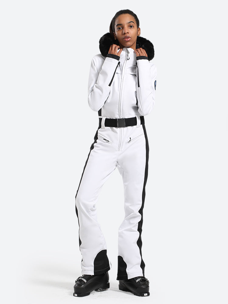 Les Odettes women's classic faux fur one-piece ski suit for winter skiing, featuring a warm, stylish ski outfit with faux fur accents.
