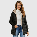 Les Odettes Geraldine Sherpa-lined winter coat with warm fleece interior and stylish exterior in a cozy, winter-ready design.