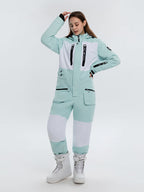 Women's Arctic Queen Slope Star Icon ski suit by Les Odettes, a winter snow jumpsuit with a stylish one-piece design in a snowy setting.